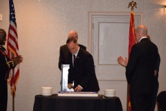 Neal Perdue cuts birthday cake